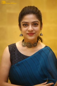 Telugu actress varsha bollamma in a blue saree