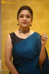 Telugu actress varsha bollamma in a blue saree