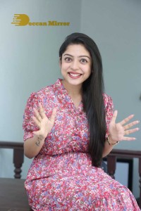 Varsha Bollamma Photoshoot in a Pink Dress