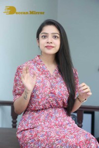 Varsha Bollamma Photoshoot in a Pink Dress