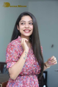 Varsha Bollamma Photoshoot in a Pink Dress