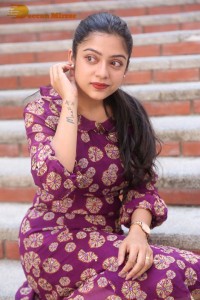 Telugu Actress Varsha Bollamma Photoshoot in a violet dress