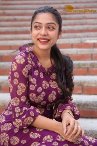 Telugu Actress Varsha Bollamma Photoshoot in a violet dress