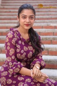 Telugu Actress Varsha Bollamma Photoshoot in a violet dress