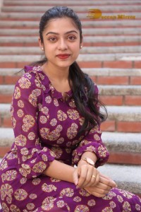 Telugu Actress Varsha Bollamma Photoshoot in a violet dress