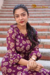 Telugu Actress Varsha Bollamma Photoshoot in a violet dress