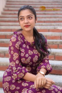 Telugu Actress Varsha Bollamma Photoshoot in a violet dress