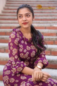 Telugu Actress Varsha Bollamma Photoshoot in a violet dress