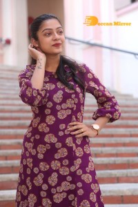 Telugu Actress Varsha Bollamma Photoshoot in a violet dress
