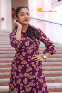 Telugu Actress Varsha Bollamma Photoshoot in a violet dress