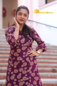 Telugu Actress Varsha Bollamma Photoshoot in a violet dress