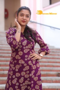 Telugu Actress Varsha Bollamma Photoshoot in a violet dress