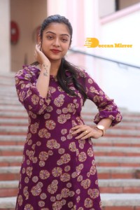 Telugu Actress Varsha Bollamma Photoshoot in a violet dress