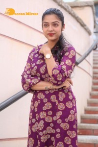 Telugu Actress Varsha Bollamma Photoshoot in a violet dress