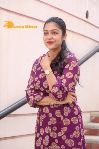 Telugu Actress Varsha Bollamma Photoshoot in a violet dress
