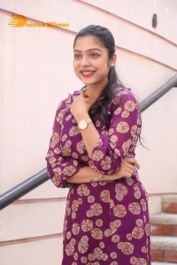 Telugu Actress Varsha Bollamma Photoshoot in a violet dress