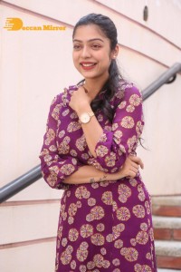 Telugu Actress Varsha Bollamma Photoshoot in a violet dress