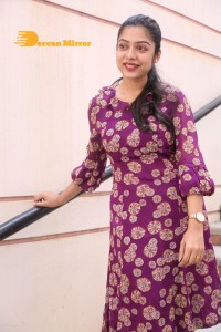 Telugu Actress Varsha Bollamma Photoshoot in a violet dress