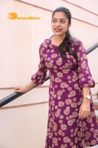 Telugu Actress Varsha Bollamma Photoshoot in a violet dress