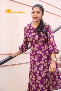 Telugu Actress Varsha Bollamma Photoshoot in a violet dress