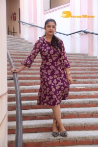 Telugu Actress Varsha Bollamma Photoshoot in a violet dress