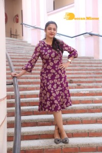 Telugu Actress Varsha Bollamma Photoshoot in a violet dress
