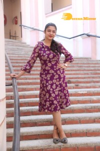 Telugu Actress Varsha Bollamma Photoshoot in a violet dress