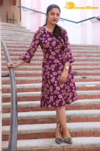 Telugu Actress Varsha Bollamma Photoshoot in a violet dress