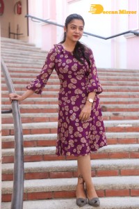 Telugu Actress Varsha Bollamma Photoshoot in a violet dress