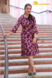 Telugu Actress Varsha Bollamma Photoshoot in a violet dress