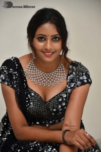 Vasista Chowdary in a Black Dress posing for a Photoshoot