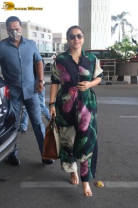 actress vidya balan in a colorful dress at the airport