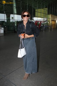 actress Wamiqa Gabbi chic look in a denim skirt at airport