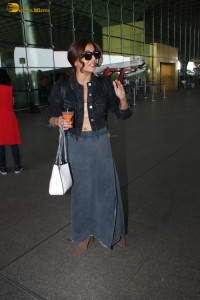 actress Wamiqa Gabbi chic look in a denim skirt at airport