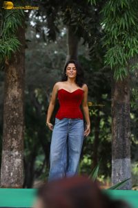 bollywood actress wamiqa gabbi chic look in a red top and denim jeans