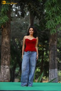 bollywood actress wamiqa gabbi chic look in a red top and denim jeans