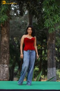 bollywood actress wamiqa gabbi chic look in a red top and denim jeans