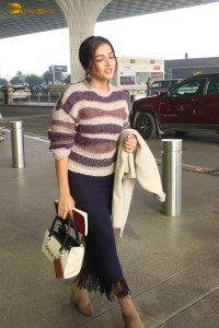 actress wamiqa gabbi cute in a colorful sweater at mumbai airport