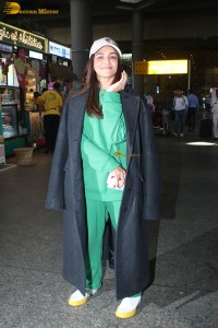Bollywood actress Wamiqa Gabbi cute in a green dress at mumbai airport