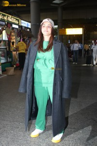 Bollywood actress Wamiqa Gabbi cute in a green dress at mumbai airport