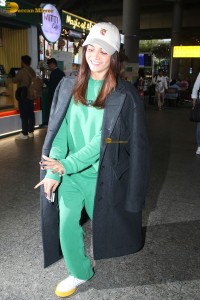 Bollywood actress Wamiqa Gabbi cute in a green dress at mumbai airport