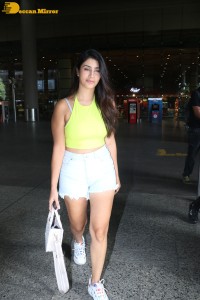 Actress Warina Hussain seen in a green top and denim shorts