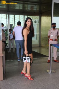 Actress Warina Hussain seen at Airport in a black dress