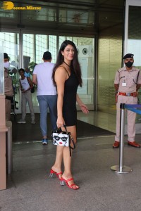 Actress Warina Hussain seen at Airport in a black dress