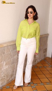 Actress Yami Gautam in a green shirt