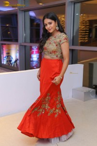actress yamini bandaru photoshoot in a red skirt and matching top