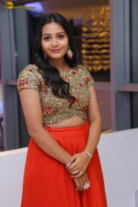 actress yamini bandaru photoshoot in a red skirt and matching top