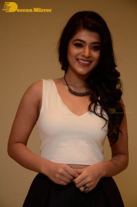 Telugu Actress Yamini Bhaskar Photoshoot in a white top and black skirt