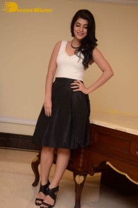 Telugu Actress Yamini Bhaskar Photoshoot in a white top and black skirt