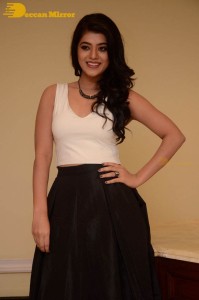 Telugu Actress Yamini Bhaskar Photoshoot in a white top and black skirt